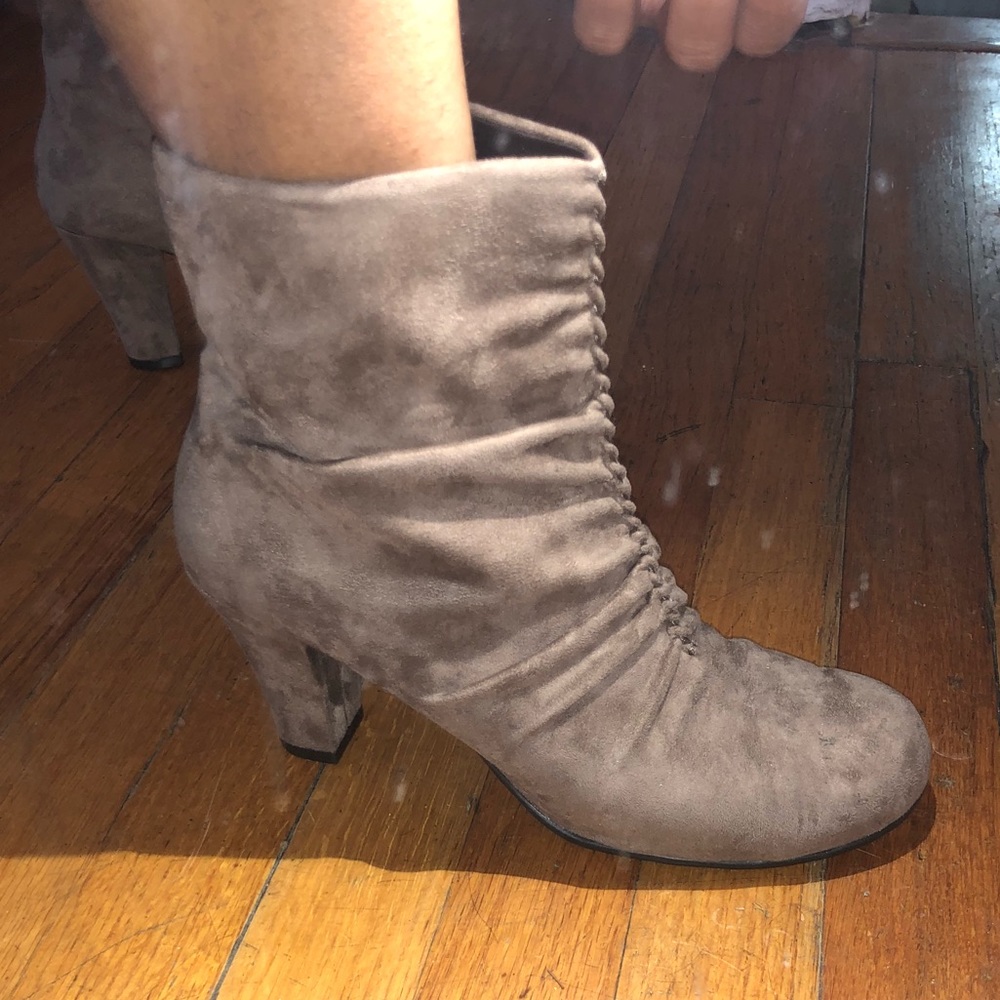 Tan heeled booties.